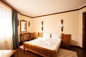 Фото номера Люкс (для 2 взрослых и 2 детей) Отель Hotel Tanne г. Банско 7