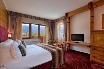Фото номера Полулюкс с видом на горы Отель Kempinski Hotel Grand Arena г. Банско 3