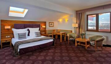 Фото номера Полулюкс с видом на город Отель Kempinski Hotel Grand Arena г. Банско 8